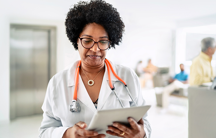 provider reviewing data on a tablet