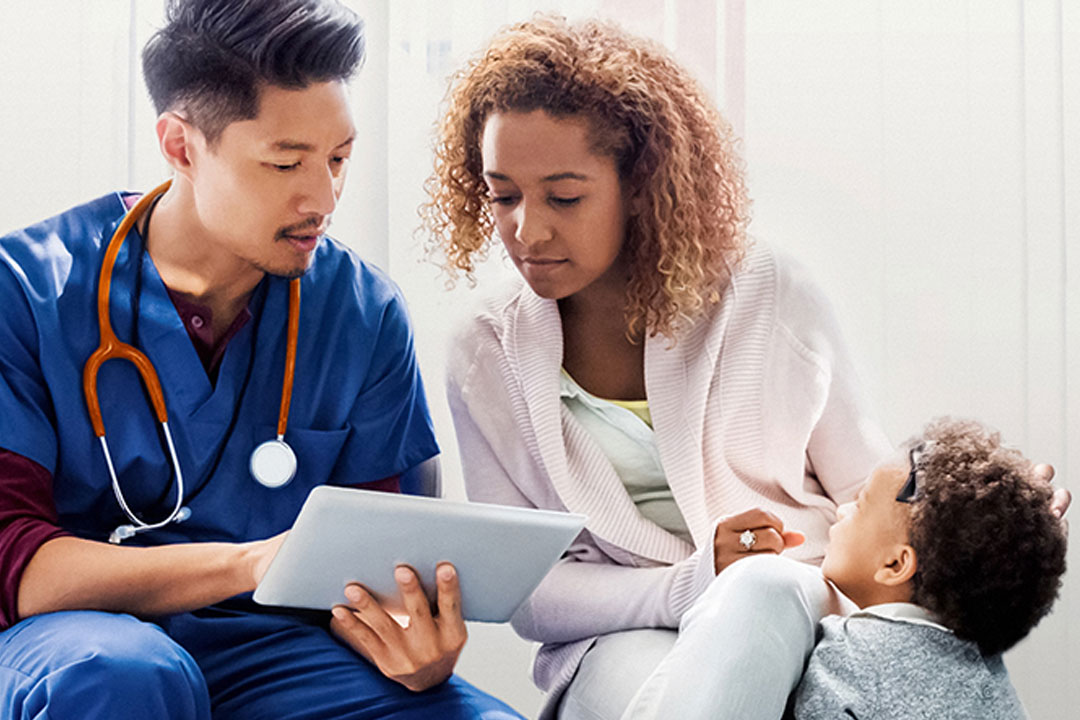 Medical professional with patient and child